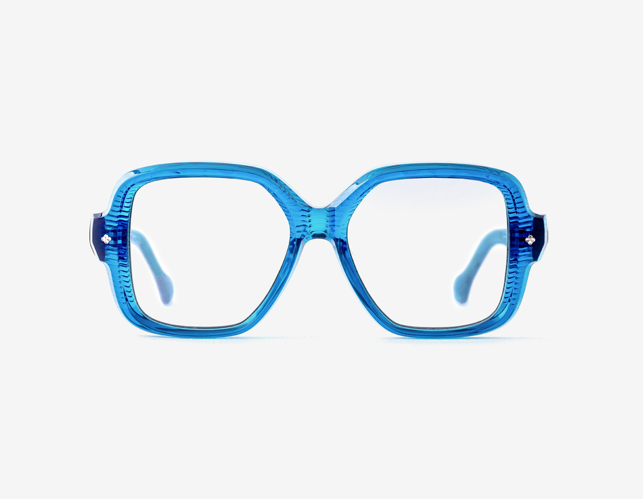 Luxury Japanese eyewear – Bellesguard Cerulean Clarity optical frame (RX), acetate in Cerulean Clarity, Platinum plating, front view. Luxury Japanese eyewear – Bellesguard Cerulean Clarity optical frame (RX), acetate in Cerulean Clarity, Platinum plating, front view.