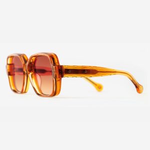 Luxury Japanese eyewear – Bellesguard Terra Dorada sunglasses, acetate in Terra Dorada, Amber Meld lenses, 18ct Gold plating, Filter Category 2, left view.
