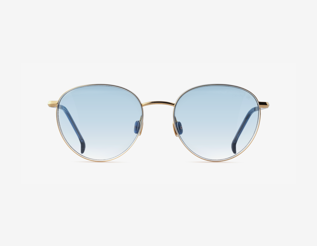 Japanese titanium round red carpet eyewear – Gadolin Nordic Sky F1 lenses red carpet, titanium in 18k Gold, acetate in Midnight Indigo