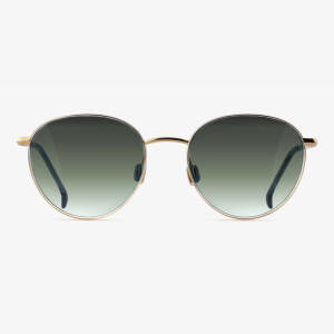 GADOLIN sunglasses in Midnight Indigo with 18K gold titanium frame and Foliage Shade lenses