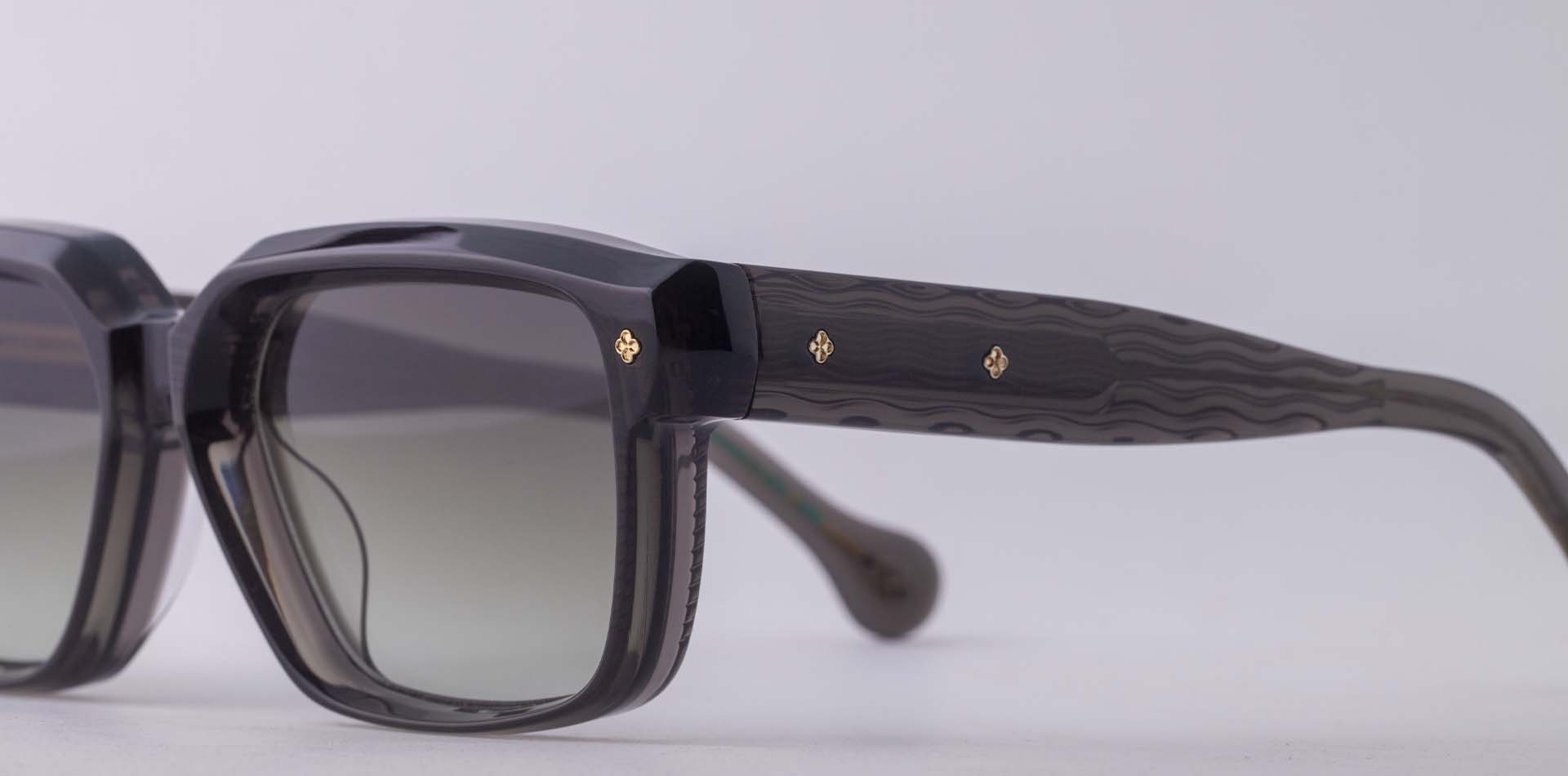 Tres Dragons acetate sunglasses showing wave-pattern temple detail and Japanese craftsmanship