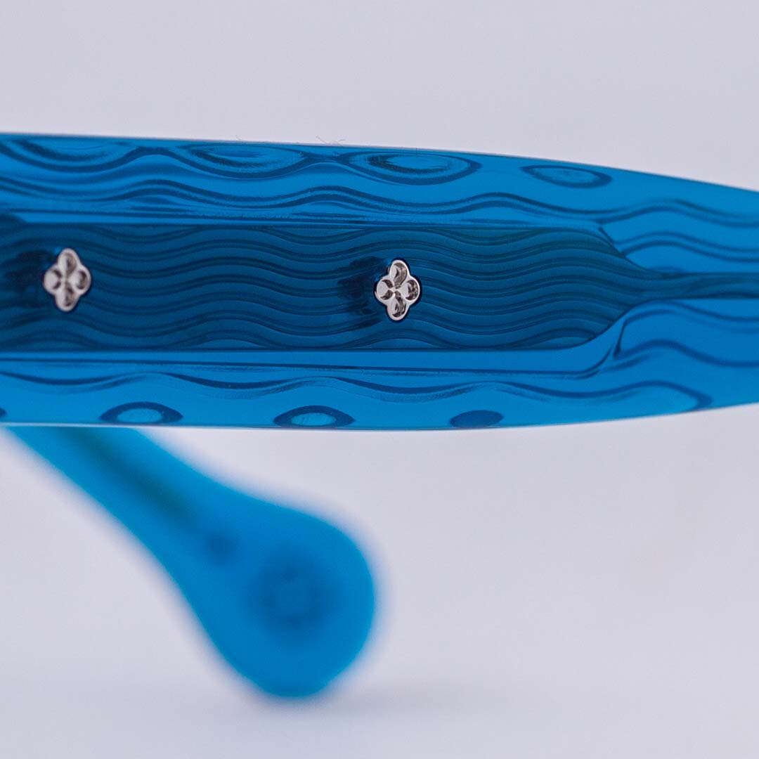 Blue layered acetate arm detail from the Barcelunettes Vagues collection